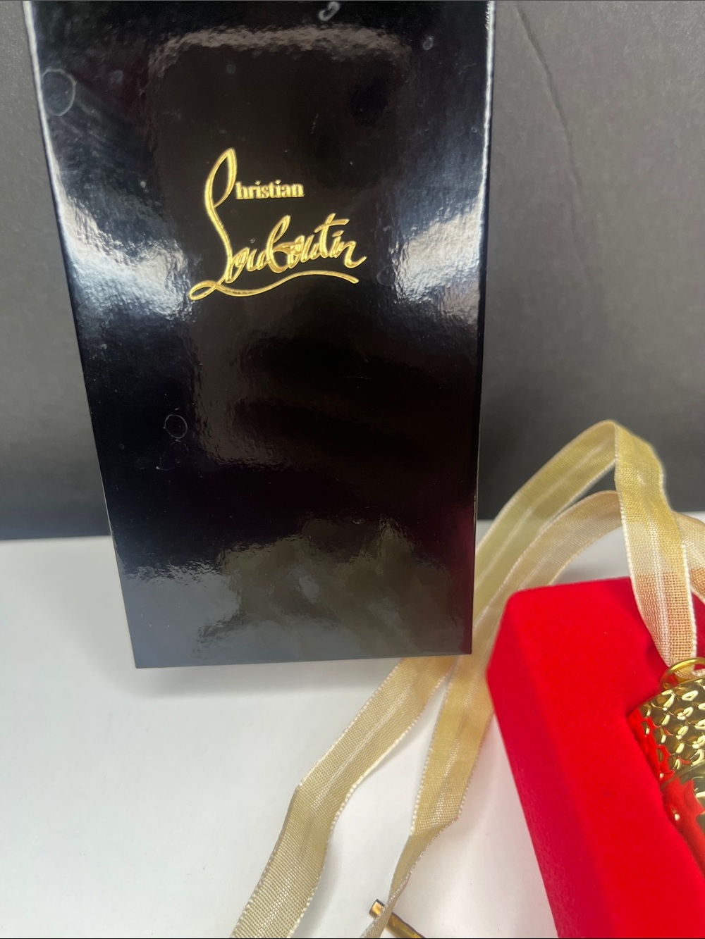 Christian Louboutin Gold Bullet Lipstick in Bright Coral Pink